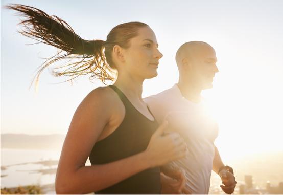 couple running in sunshine